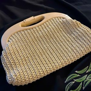 VTG Plastic Weave purse with linen interior. One small stain on the inside.